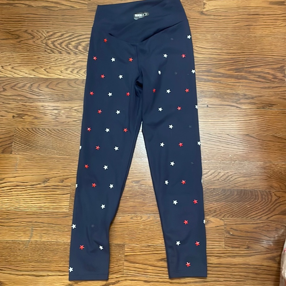 Beach riot navy leggings. Cross front. Star studs